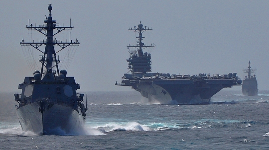 TIMOR SEA (July 6, 2015) - The Arleigh Burke-class guided-missile destroyer USS Mustin (DDG 89), left, the Nimitz-class aircraft carrier USS George Washington (CVN 73), and the Ticonderoga-class guided-missile cruiser USS Antietam (CG 54) transit in formation. A new virtual cyber ship called USS Secure - not pictured - is also emerging on the horizon. The USS Secure testbed is designed to turn Navy ships such as the Mustin, Washington, and Antietam into cybersafe warships. Cybersecurity experts from the Navy and Joint Staff will examine USS Secure's ability to transition its cyberdefense technologies to the Fleet by replicating a naval combatant in a system of systems environment during a March 2016 test event. (U.S. Navy photo/Released)